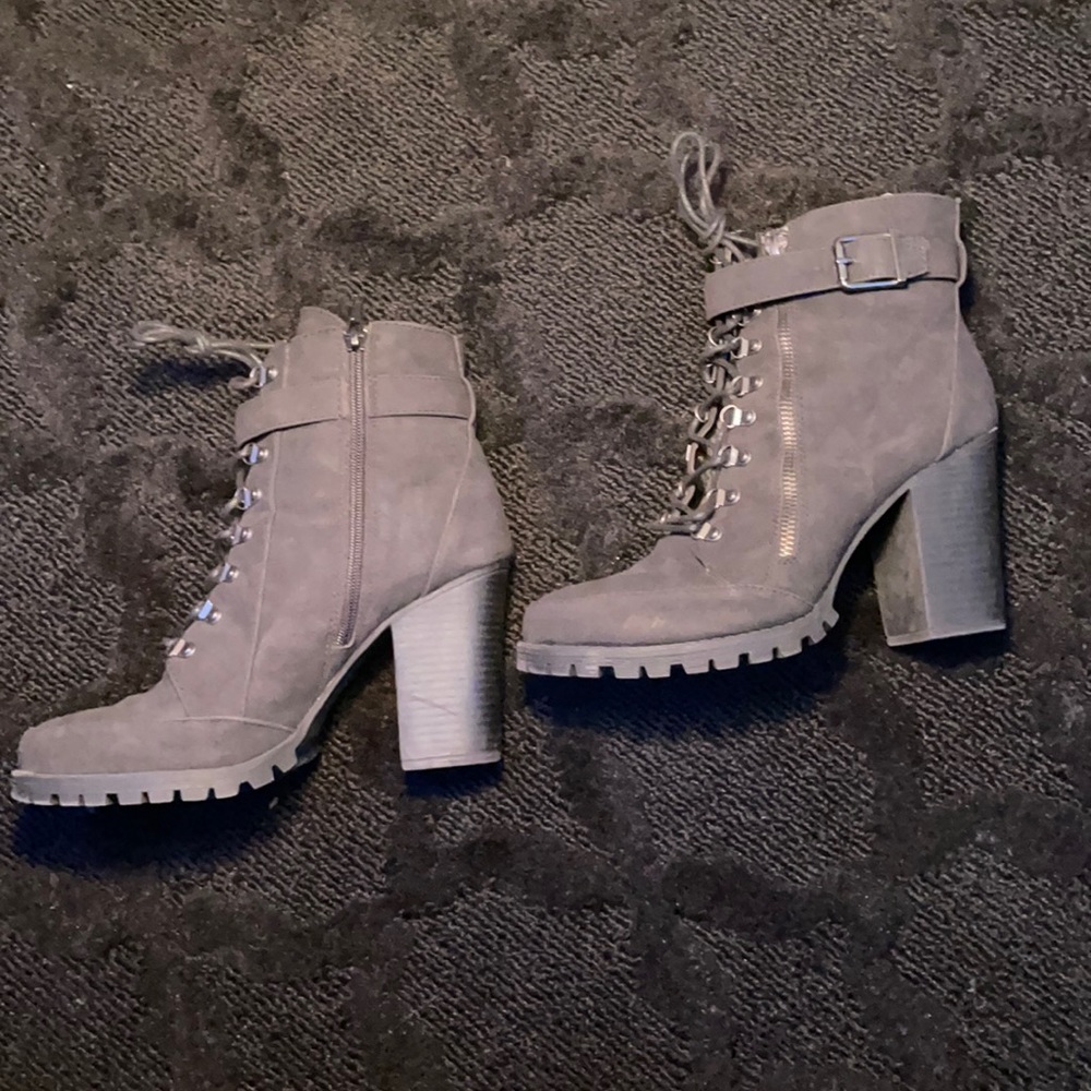 Black zip up heeled boots